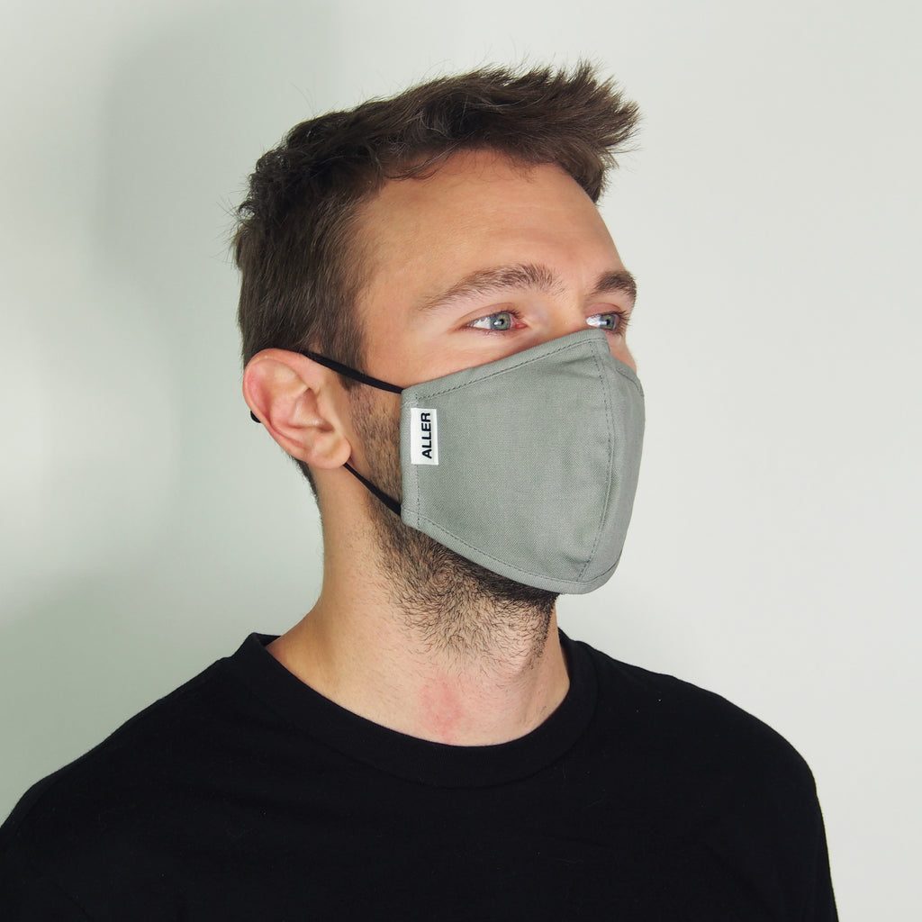 Grey with filter reusable mask on a person